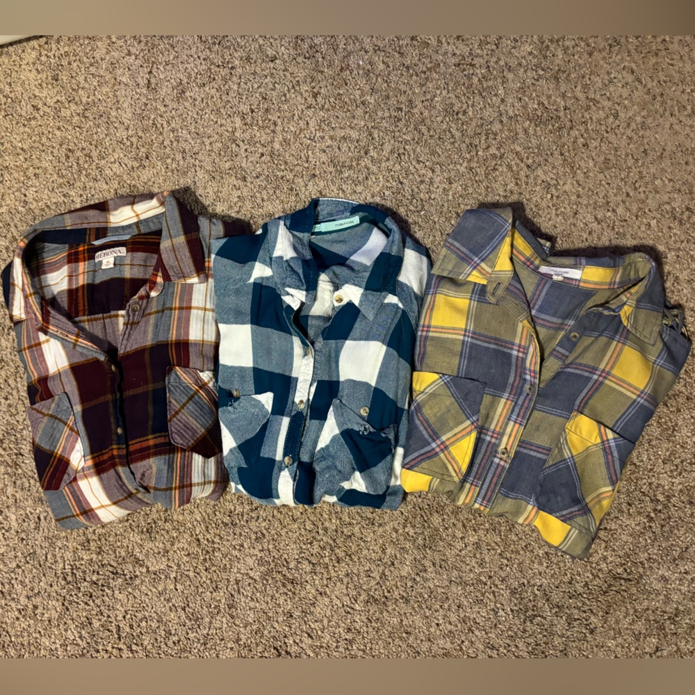 3 flannel shirts. Size large